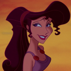 a white feminine person with long brown hair put into a high ponytail, purple eyes with purple eyeshadow, red lips, and a purple strapped dress with orange adornments on the straps is staring awkwardly at the camera. the background is an orange gradient.