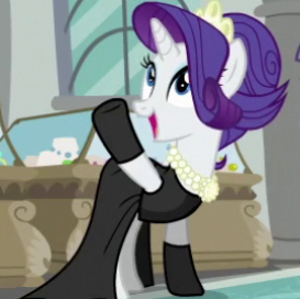 a white cartoon unicorn with purple hair in an updo with a small crown, blue eyes with blue eyeshadow, and a long flowy black dress with black gloves and a pear neckalce is holding her left hoolf up and staring happily off camera. the background is seemingly a studio or lounge.